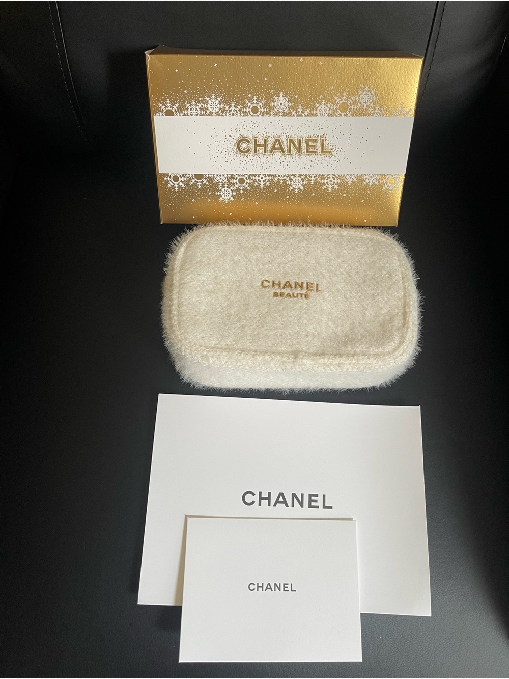 CHANEL Cream Faux-Fur Cosmetic Pouch with Gold Logo. Limited edition